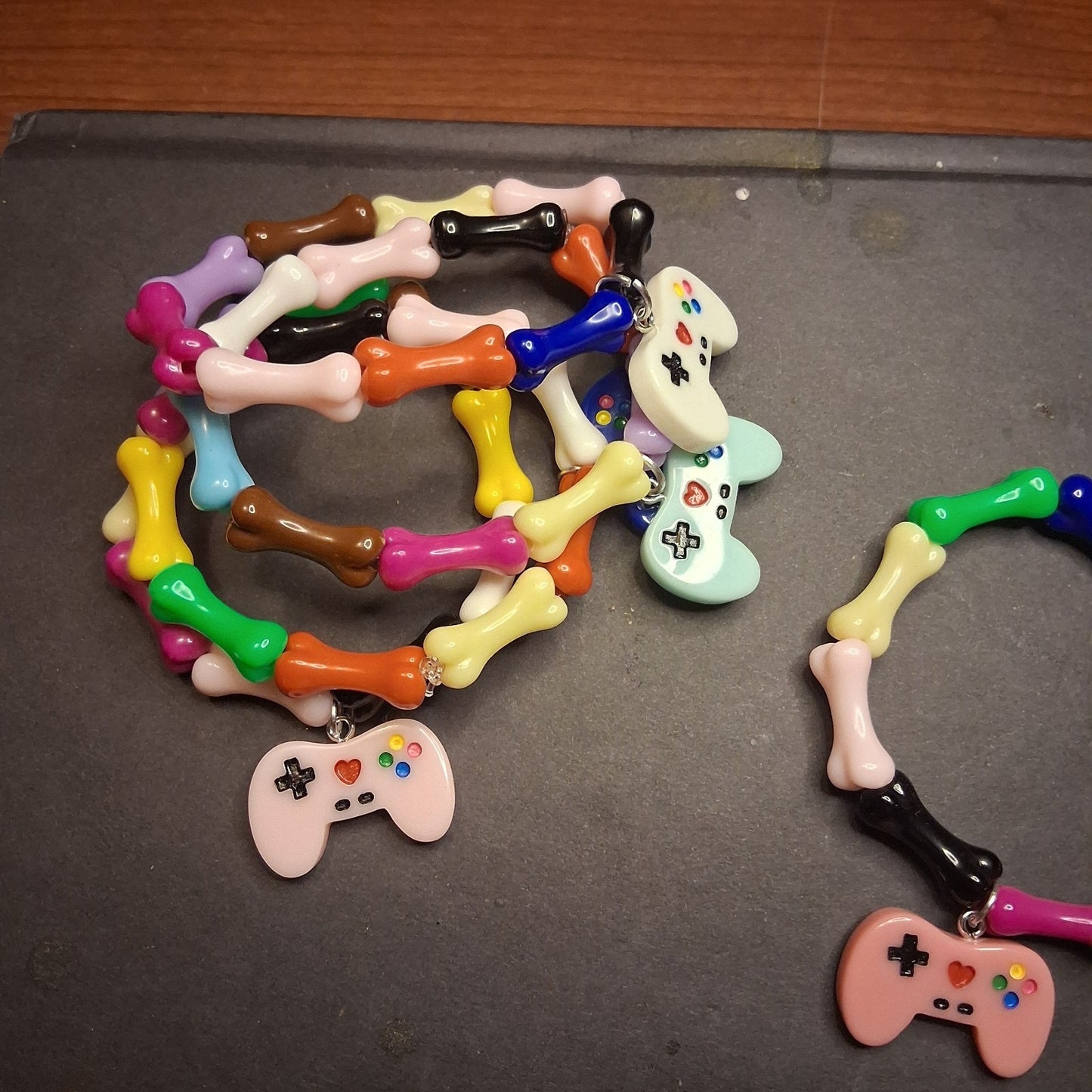 Random Color Bone Game Controller Emo Bracelet Unisex Stretchy Wristband Gift