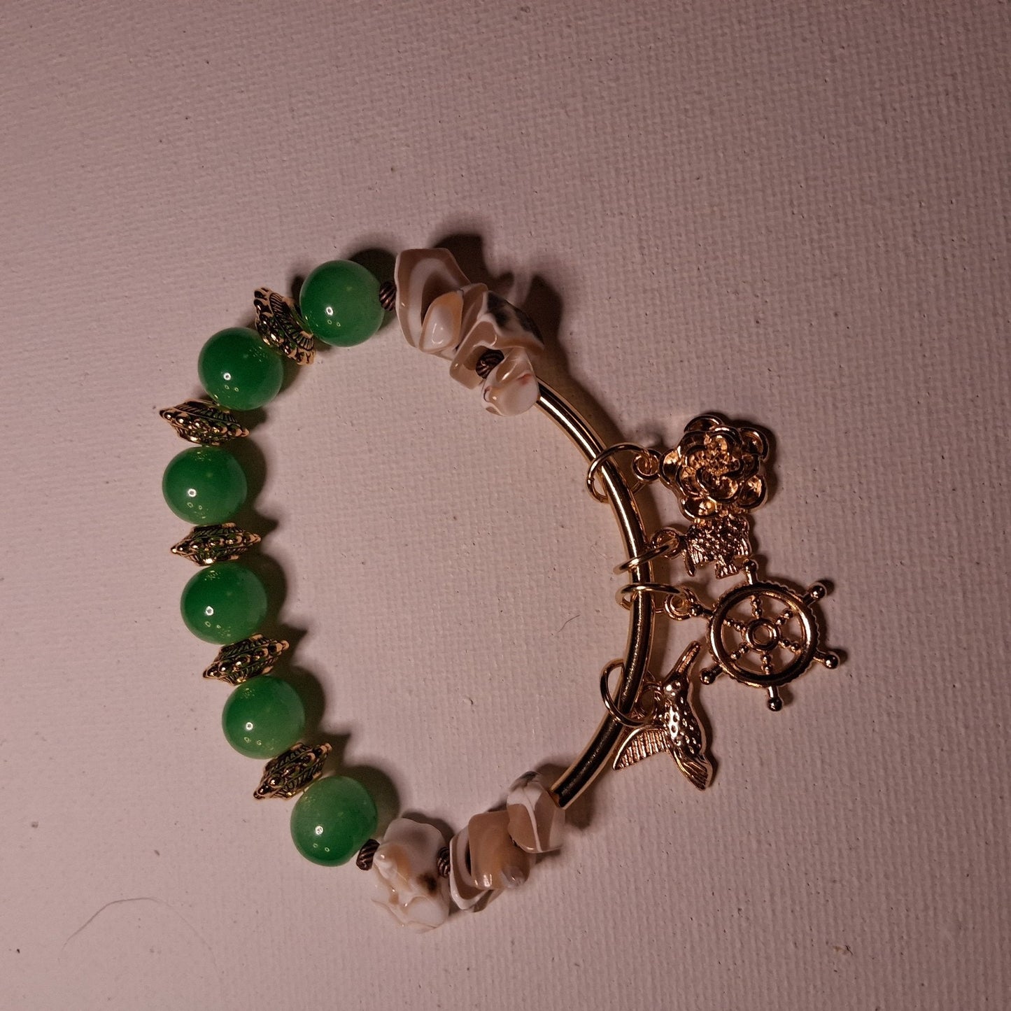 Travel CHARM bracelet Handmade With Green Glass Beads, Shell Beads, Gold & Brass