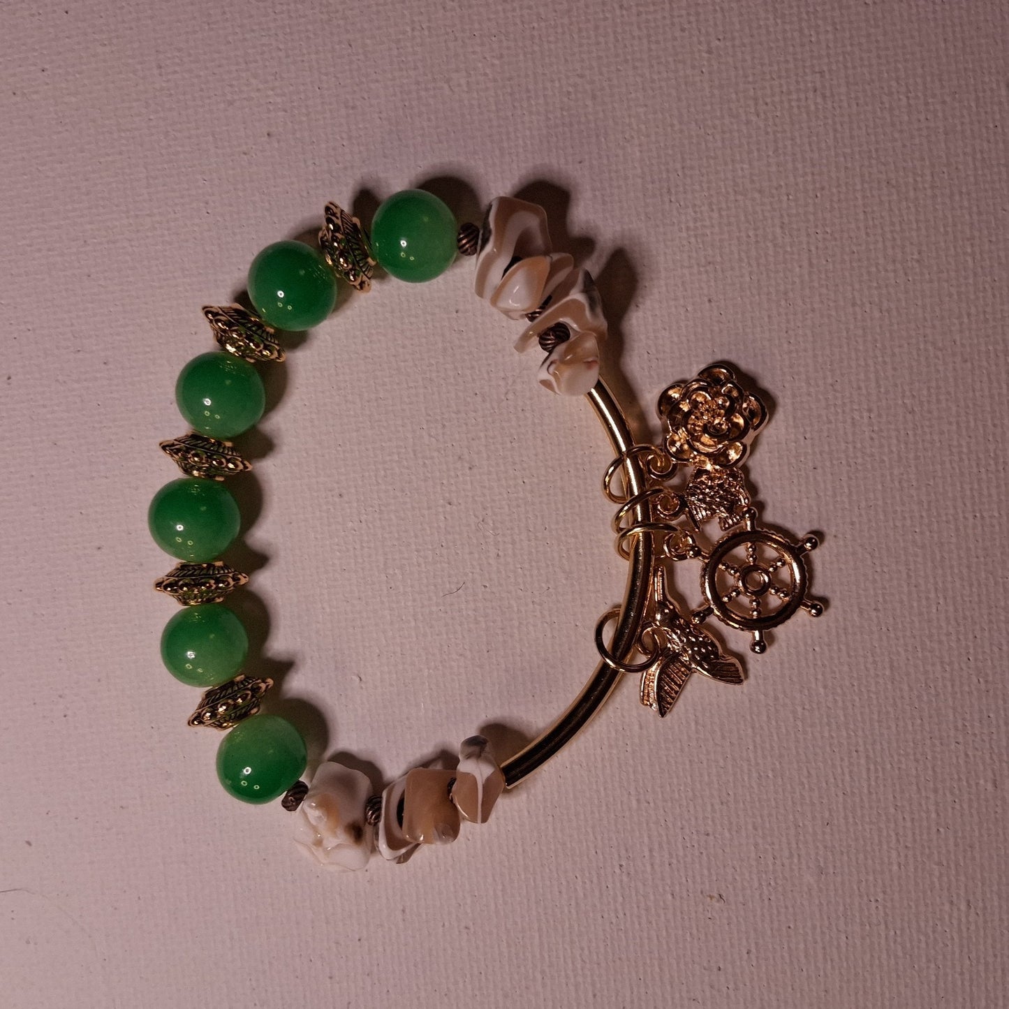 Travel CHARM bracelet Handmade With Green Glass Beads, Shell Beads, Gold & Brass